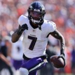 Oct 6, 2024; Cincinnati, Ohio, USA; Baltimore Ravens wide receiver Rashod Bateman (7) scores a touchdown during the second quarter against the Cincinnati Bengals at Paycor Stadium.