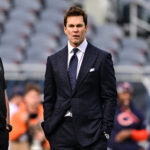 Nov 17, 2024; Chicago, Illinois, USA; Former quarterback and current NFL announcer Tom Brady looks on before the game between the Chicago Bears and Green Bay Packers at Soldier Field. Mandatory Credit: Daniel Bartel-Imagn Images