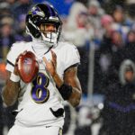 Baltimore Ravens quarterback Lamar Jackson gets ready to launch the ball during first half action at the Buffalo Bills divisional game against the Baltimore Ravens at Highmark Stadium in Orchard Park on Jan. 19, 2025.