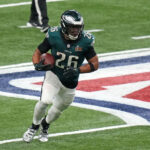 Feb 9, 2025; New Orleans, LA, USA; Philadelphia Eagles running back Saquon Barkley (26) rushes the ball against the Kansas City Chiefs during the third quarter in Super Bowl LIX at Caesars Superdome. Mandatory Credit: Kirby Lee-Imagn Images