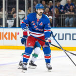 Mar 22, 2025; New York, New York, USA; New York Rangers left wing Chris Kreider (20) skates against the Vancouver Canucks during the second period at Madison Square Garden. Mandatory Credit: Danny Wild-Imagn Images