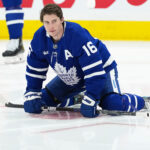 Apr 17, 2025; Toronto, Ontario, CAN; Toronto Maple Leafs right wing Mitch Marner (16) stretches during the warmup before a game against the Detroit Red Wings at Scotiabank Arena.