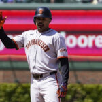 May 7, 2025; Chicago, Illinois, USA; San Francisco Giants first base LaMonte Wade Jr. (31) gestures after hittin a one run double against the Chicago Cubs during the fourth inning at Wrigley Field. Mandatory Credit: David Banks-Imagn Images