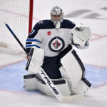 May 17, 2025; Dallas, Texas, USA; Winnipeg Jets goaltender Connor Hellebuyck (37) faces the Dallas Stars attack during the first period in game six of the second round of the 2025 Stanley Cup Playoffs at American Airlines Center.