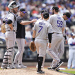 Jun 1, 2025; New York City, New York, USA; Colorado Rockies interim manager Warren Schaeffer (34) makes a pitching change to Colorado Rockies pitcher Jake Bird (59) during the fifth inning against the New York Mets at Citi Field.