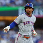 Jun 2, 2025; Los Angeles, California, USA; New York Mets shortstop Francisco Lindor (12) rounds the bases during the first inning against the Los Angeles Dodgers during the first inning against the New York Mets at Dodger Stadium. Mandatory Credit: Jason Parkhurst-Imagn Images