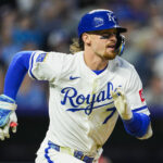 May 28, 2025; Kansas City, Missouri, USA; Kansas City Royals shortstop Bobby Witt Jr. (7) runs to first base after hitting a sacrifice fly during the seventh inning against the Cincinnati Reds at Kauffman Stadium. Mandatory Credit: Jay Biggerstaff-Imagn Images