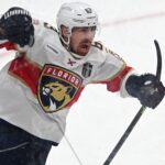 Jun 6, 2025; Edmonton, Alberta, CAN; Florida Panthers center Brad Marchand (63) reacts after scoring a goal on Edmonton Oilers goaltender Stuart Skinner (74) during the second period in game two of the 2025 Stanley Cup Final at Rogers Place. Mandatory Credit: Walter Tychnowicz-Imagn Images