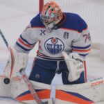 Jun 9, 2025; Sunrise, Florida, USA; Edmonton Oilers goaltender Stuart Skinner (74) blocks a shot on goal during the second period against the Florida Panthers in game three of the 2025 Stanley Cup Final at Amerant Bank Arena. Mandatory Credit: Sam Navarro-Imagn Images