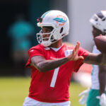Jun 10, 2025; Miami, FL, USA; Miami Dolphins quarterback Tua Tagovailoa (1) throws the football during mandatory minicamp at Hard Rock Stadium. Mandatory Credit: Sam Navarro-Imagn Images