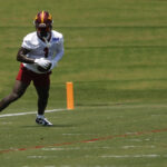 Jun 10, 2025; Ashburn, VA, USA; Washington Commanders wide receiver Deebo Samuel Sr. (1) catches a pass during drills on day one of minicamp at Commanders Park. Mandatory Credit: Geoff Burke-Imagn Images
