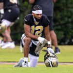 Jun 10, 2025; New Orleans, LA, USA; New Orleans Saints wide receiver Chris Olave (12) looks on during minicamp at Ochsner Sports Performance Center.