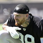 Jun 10, 2025; Henderson, NV, USA; Las Vegas Raiders defensive end Maxx Crosby (98) looks on during the team stretch during Las Vegas Raiders Minicamp at Intermountain Health Performance Center. Mandatory Credit: Candice Ward-Imagn Images