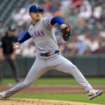 Jun 10, 2025; Minneapolis, Minnesota, USA; Texas Rangers starting pitcher Tyler Mahle (51) delivers a pitch against the Minnesota Twins in the first inning at Target Field. Mandatory Credit: Jesse Johnson-Imagn Images