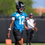 Jacksonville Jaguars wide receiver Travis Hunter (12) walks on the field during the second mandatory minicamp at Miller Electric Center Wednesday, June 11, 2025 in Jacksonville, Fla.