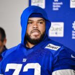 Jun 18, 2025; East Rutherford, NJ, USA; New York Giants guard Jermaine Eluemunor (72) speaks at a press conference during minicamp at Quest Diagnostics Training Center. Mandatory Credit: John Jones-Imagn Images