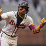Jun 18, 2025; Cumberland, Georgia, USA; Atlanta Braves right fielder Ronald Acuna Jr (13) reacts after hitting a lead off home run against the New York Mets during the first inning at Truist Park. Mandatory Credit: Dale Zanine-Imagn Images