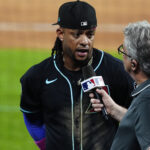 Jun 21, 2025; Denver, Colorado, USA; Arizona Diamondbacks second baseman Ketel Marte (4) is interviewed following the win against the Colorado Rockies at Coors Field. Mandatory Credit: Ron Chenoy-Imagn Images