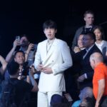 Jun 25, 2025; Brooklyn, NY, USA; Yang Hansen walks to the stage after being selected as the 16th pick by the Memphis Grizzlies in the first round of the 2025 NBA Draft at Barclays Center. Mandatory Credit: Brad Penner-Imagn Images
