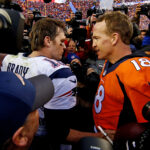 Quarterbacks Jan 24, 2016; Denver, CO, USA; New England Patriots quarterback Tom Brady (12) and Denver Broncos quarterback Peyton Manning (18) shake hands and speak after the game in the AFC Championship football game at Sports Authority Field at Mile High. Mandatory Credit: Kevin Jairaj-USA TODAY Sports
