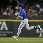 Jun 19, 2025; Arlington, Texas, USA; Kansas City Royals right fielder Jac Caglianone (14) rounds the bases after hitting a home run against the Texas Rangers during the ninth inning at Globe Life Field.