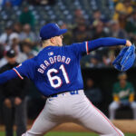 Sep 25, 2024; Oakland, California, USA; Texas Rangers starting pitcher Cody Bradford (61) pitches the ball against the Oakland Athletics during the first inning at Oakland-Alameda County Coliseum.