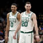 Dec 14, 2018; Boston, MA, USA; Boston Celtics forward Gordon Hayward (20) and forward Jayson Tatum (0) share a laugh during the second half of Boston's 129-108 win over the Atlanta Hawks at TD Garden. Mandatory Credit: Winslow Townson-USA TODAY Sports