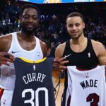 Feb 10, 2019; Oakland, CA, USA; Miami Heat guard Dwyane Wade (3) and Golden State Warriors guard Stephen Curry (30) exchange jerseys after the game at Oracle Arena. Mandatory Credit: Kelley L Cox-Imagn Images