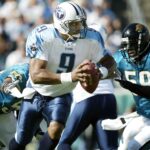 Tennessee Titans quarterback Steve McNair (9) scrambles out of the pocket during the game against the Jaguars at Alltell Stadium in Jacksonville Dec. 22, 2002. The Titans defeated their AFC South foe 28-10. 021222 B