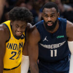 Dec 10, 2021; Indianapolis, Indiana, USA; Two Michigan alumni, Indiana Pacers guard Caris LeVert (22) and Dallas Mavericks forward Tim Hardaway Jr. (11) in the second half at Gainbridge Fieldhouse.