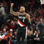 Jan 25, 2023; Portland, Oregon, USA; Portland Trail Blazers guard Damian Lillard (0) reacts after shooting a three-point shot over Utah Jazz in the second half at Moda Center.