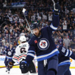 Feb 11, 2023; Winnipeg, Manitoba, CAN; Winnipeg Jets right wing Blake Wheeler (26) celebrates his second period goal against the Chicago Blackhawks at Canada Life Centre. Mandatory Credit: James Carey Lauder-USA TODAY Sports