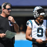 Oct 1, 2023; Charlotte, North Carolina, USA; Carolina Panthers head coach Frank Reich with quarterback Bryce Young (9) in the second quarter at Bank of America Stadium. Mandatory Credit: Bob Donnan-USA TODAY Sports