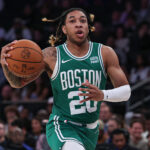 JD Davison Celtics Oct 9, 2023; New York, New York, USA; Boston Celtics guard JD Davison (20) drives to the basket during the first half against the New York Knicks at Madison Square Garden. Mandatory Credit: Vincent Carchietta-USA TODAY Sports