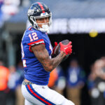 Oct 22, 2023; East Rutherford, New Jersey, USA; New York Giants tight end Darren Waller (12) catches the ball during the first half Washington Commanders at MetLife Stadium. Mandatory Credit: Vincent Carchietta-USA TODAY Sports