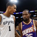 Nov 2, 2023; Phoenix, Arizona, USA; San Antonio Spurs center Victor Wembanyama (1) talks with Phoenix Suns forward Kevin Durant (35) following the game at Footprint Center. Mandatory Credit: Mark J. Rebilas-USA TODAY Sports
