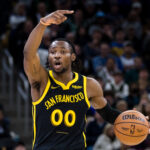 Dec 19, 2023; San Francisco, California, USA; Golden State Warriors forward Jonathan Kuminga (00) signals against the Boston Celtics during the second half at Chase Center. Mandatory Credit: John Hefti-USA TODAY Sports