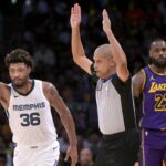 Jan 5, 2024; Los Angeles, California, USA; Memphis Grizzlies guard Marcus Smart (36) heads down court after a 3-point basket in the first half against the Los Angeles Lakers at Crypto.com Arena. Mandatory Credit: Jayne Kamin-Oncea-USA TODAY Sports