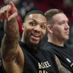 Jan 31, 2024; Portland, Oregon, USA; Milwaukee Bucks guard Damian Lillard (0) points to fans before a game against the Portland Trail Blazers at Moda Center. Mandatory Credit: Troy Wayrynen-USA TODAY Sports