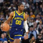 Feb 23, 2024; San Francisco, California, USA; Golden State Warriors forward Jonathan Kuminga (00) dribbles against the Charlotte Hornets during the first quarter at Chase Center. Mandatory Credit: Darren Yamashita-USA TODAY Sports