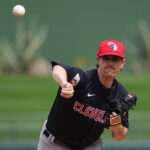 Mar 12, 2024; Surprise, Arizona, USA; Cleveland Guardians starting pitcher Shane Bieber (57) pitches against the Texas Rangers during the first inning at Surprise Stadium. Mandatory Credit: Joe Camporeale-USA TODAY Sports
