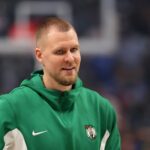 Jun 14, 2024; Dallas, Texas, USA; Boston Celtics center Kristaps Porzingis (8) looks on before game four of the 2024 NBA Finals against the Dallas Mavericks at American Airlines Center. Mandatory Credit: Peter Casey-USA TODAY Sports