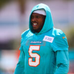Jul 28, 2024; Miami Gardens, FL, USA; Miami Dolphins cornerback Jalen Ramsey (5) looks on during training camp at Baptist Health Training Complex. Mandatory Credit: Sam Navarro-USA TODAY Sports