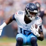 Tennessee Titans wide receiver Treylon Burks (16) runs against the Chicago Bears during the third quarter at Soldier Field in Chicago, Ill., Sunday, Sept. 8, 2024.