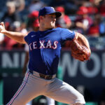 Sep 29, 2024; Anaheim, California, USA; Texas Rangers relief pitcher David Robertson (37) pitches during the ninth inning against the Los Angeles Angels at Angel Stadium. Mandatory Credit: Kiyoshi Mio-Imagn Images