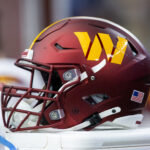 Sep 29, 2024; Glendale, Arizona, USA; Detailed view of a Washington Commanders helmet at State Farm Stadium. Mandatory Credit: Mark J. Rebilas-Imagn Images