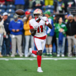 Oct 10, 2024; Seattle, Washington, USA; San Francisco 49ers wide receiver Brandon Aiyuk (11) catches the ball during warmups before the game against the Seattle Seahawks at Lumen Field. Mandatory Credit: Steven Bisig-Imagn Images