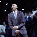 Nov 2, 2024; Toronto, Ontario, CAN; Former Toronto Raptors player Vince Carter reacts during his player number retirement ceremony at halftime of a game against the Sacramento Kings at Scotiabank Arena.