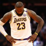LeBron James react photo Diogo Jota - Nov 26, 2024; Phoenix, Arizona, USA; Los Angeles Lakers forward LeBron James (23) reacts against the Phoenix Suns during an NBA Cup game at Footprint Center. Mandatory Credit: Mark J. Rebilas-Imagn Images