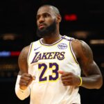 LeBron James - Nov 26, 2024; Phoenix, Arizona, USA; Los Angeles Lakers forward LeBron James (23) against the Phoenix Suns during an NBA Cup game at Footprint Center. Mandatory Credit: Mark J. Rebilas-Imagn Images